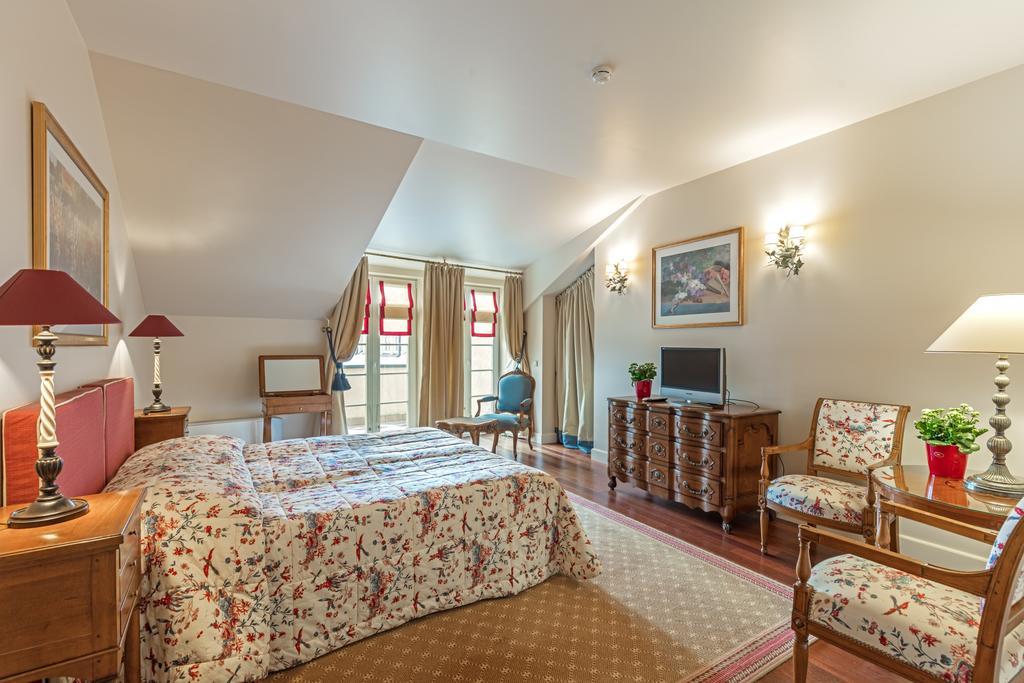 瑞莱沙托斯思提吉莱堡酒店 维尔纽斯 外观 照片 A bedroom at the hotel