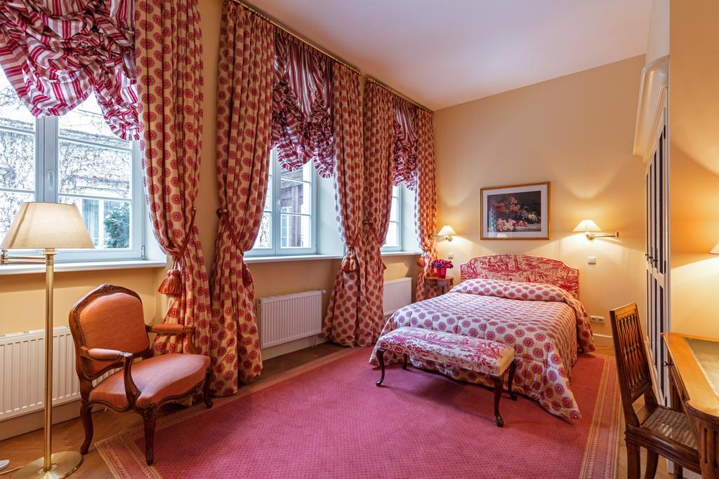 瑞莱沙托斯思提吉莱堡酒店 维尔纽斯 外观 照片 A bedroom at the hotel